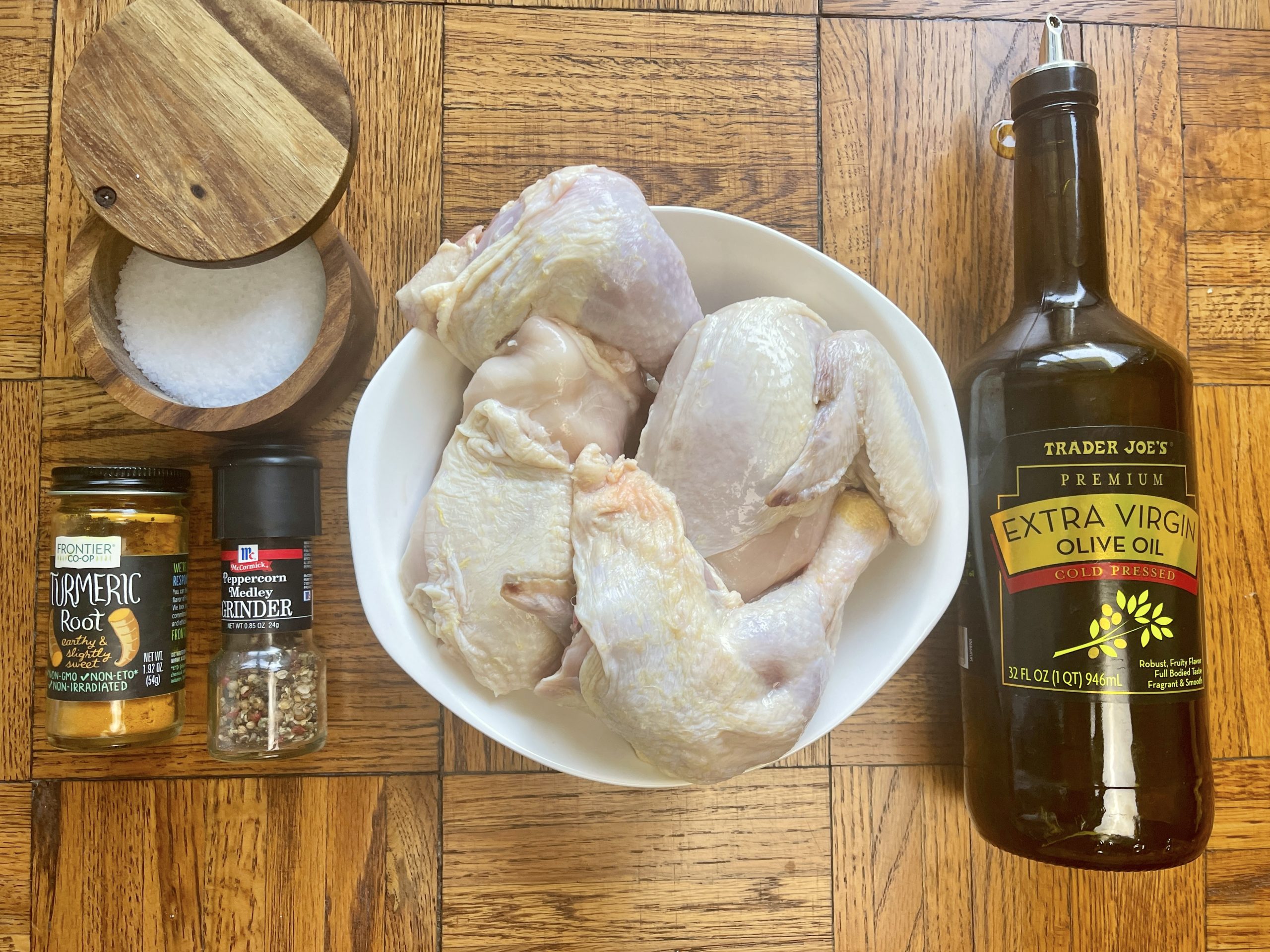 ingredients - chicken, olive oil, turmeric, kosher salt and pepper