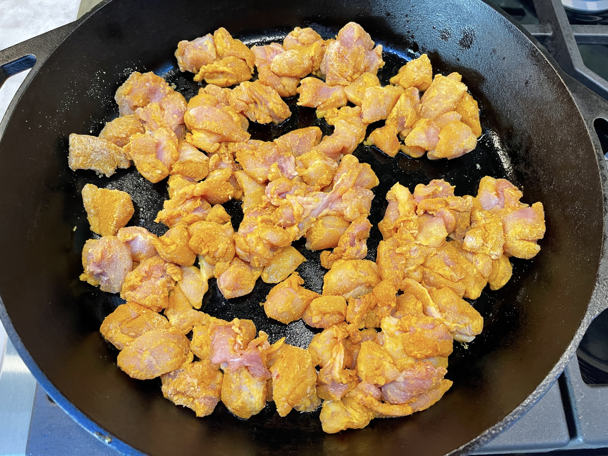 Cook turmeric chicken for 4 mins.