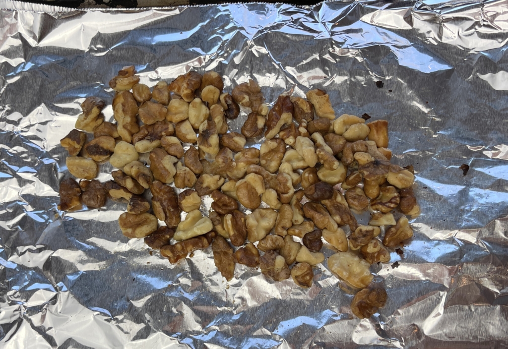 Toast the nuts in a preheated 350 degree oven for 5-8 minutes.  Set a timer.