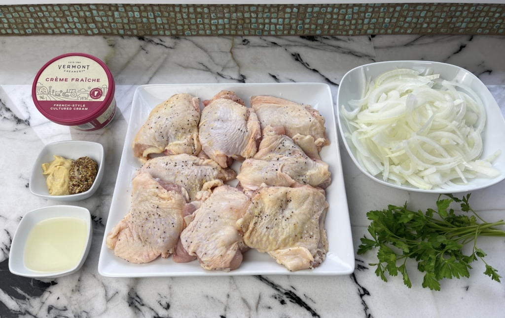 ingredients - boneless, skinless chicken thighs, dijon mustard, whole grain mustard, onion, white wine, creme fraiche and parsley