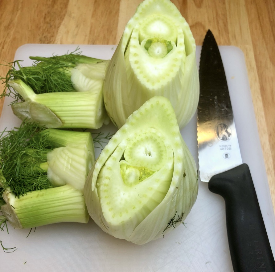 remove the tops of the fennel, reserving fronds for garnish