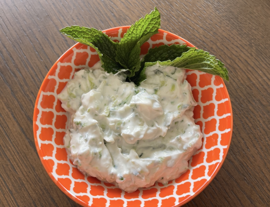 Before serving remix the tzatziki and then place in a small serving bowl and garnish as desired.
