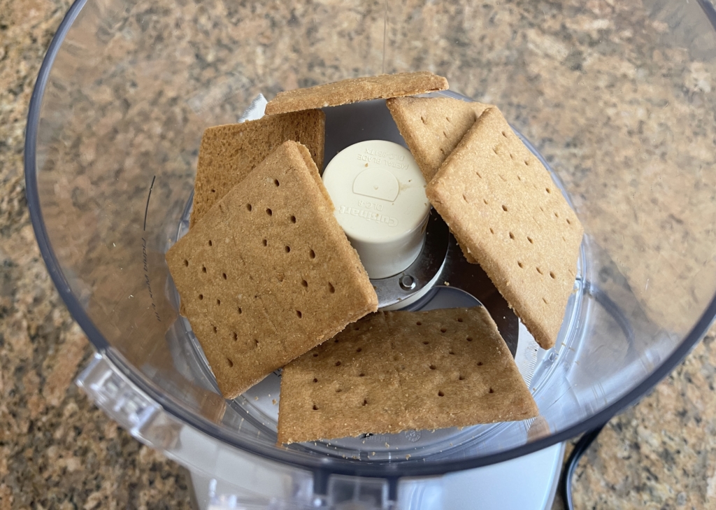 Place graham crackers into the food processor.