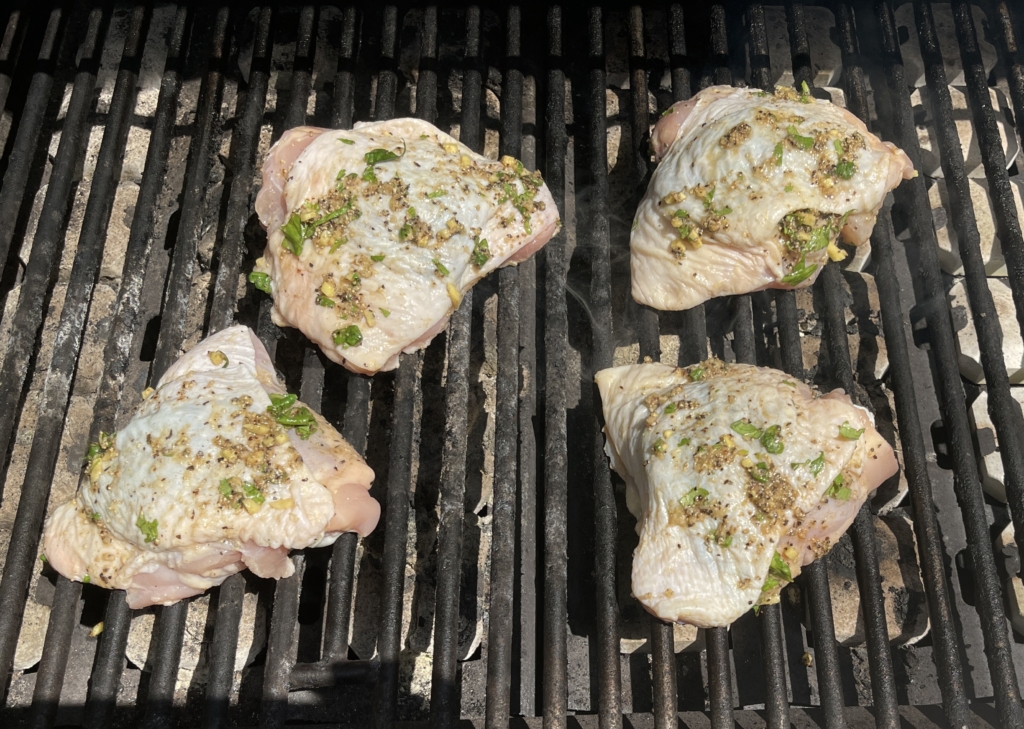 Place chicken skin-side up on the grill and cook for 15 minutes.