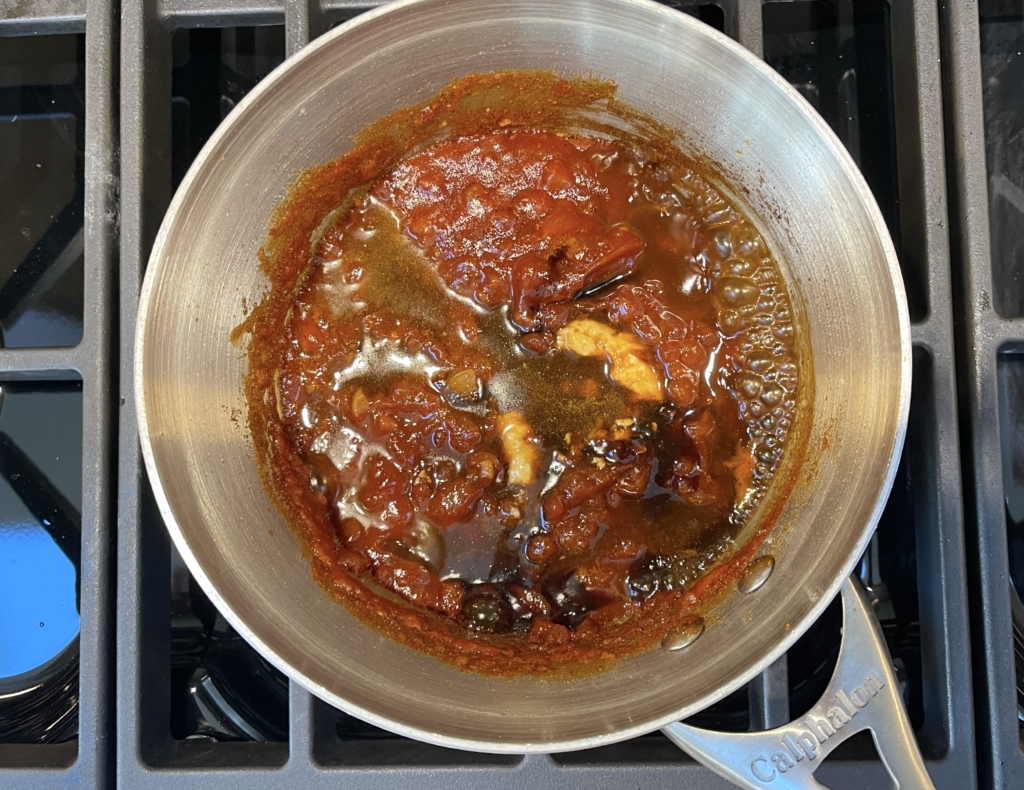 Lastly, stir in vinegar, molasses, mustard, hot sauce, and Worcestershire sauce. Bring to a boil and cook for 2 minutes stirring occasionally. 