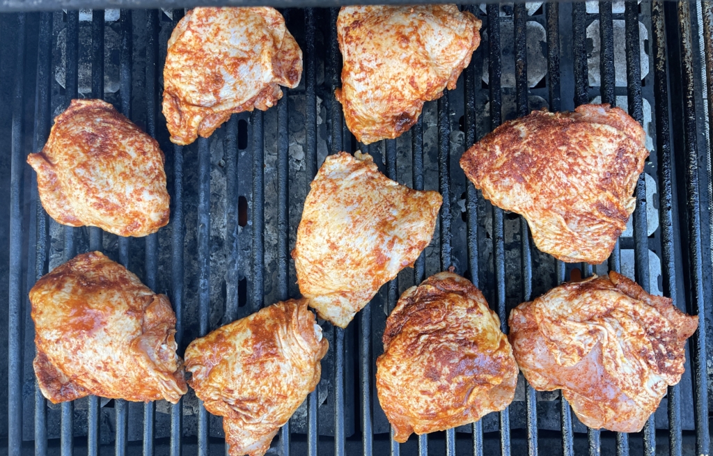 Heat grill to medium-high heat. Spray grill with oil. Place chicken skin-side-up on the grill. Cook for 10 minutes covered. 