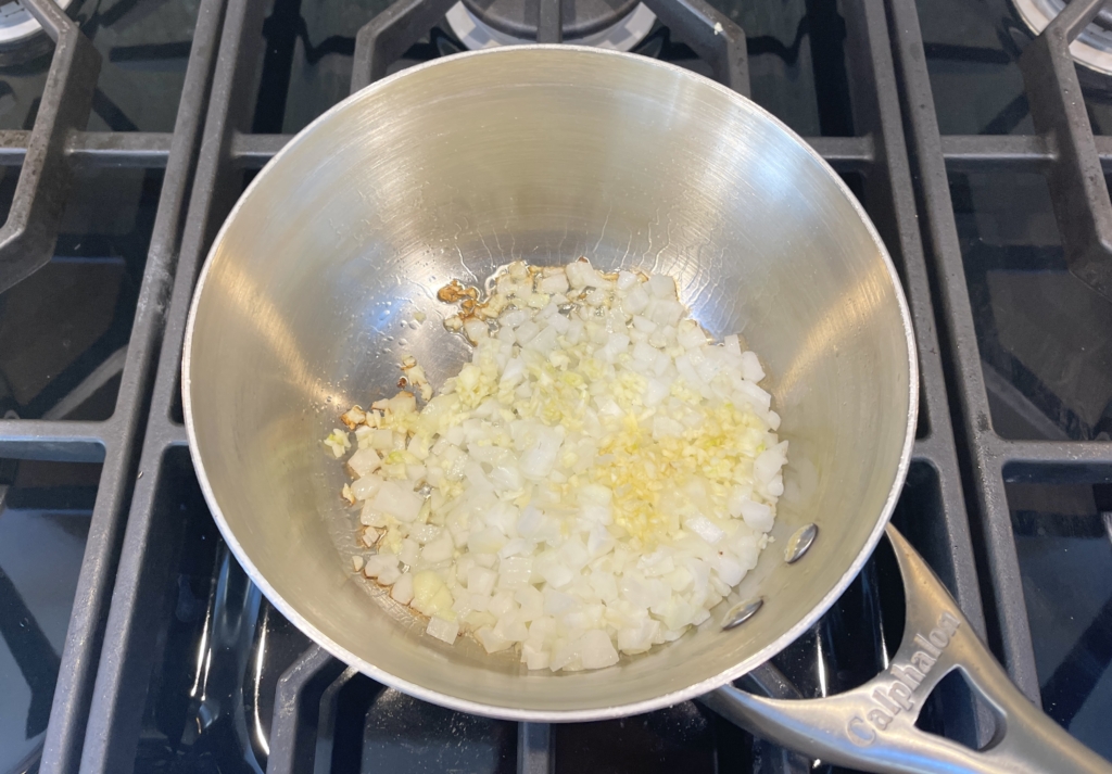 Heat oil in a medium saucepan over medium. Add onion and garlic to the pan, stirring occasionally, until tender, about 3 minutes. 