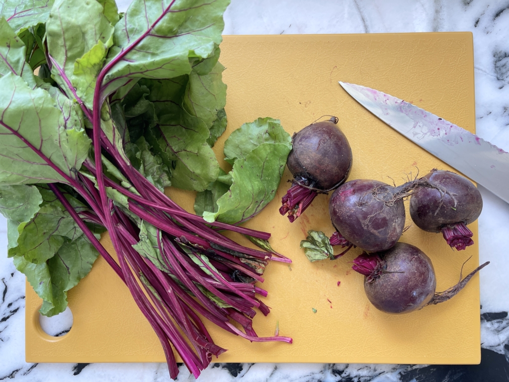 Cut the stems near the base of the beet.