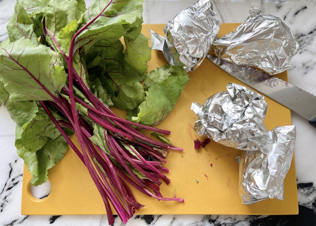 Wrap each beet in tin foil and place in the oven on a baking sheet lined with foil or parchment and roast for 50 minutes at 425 degrees. 