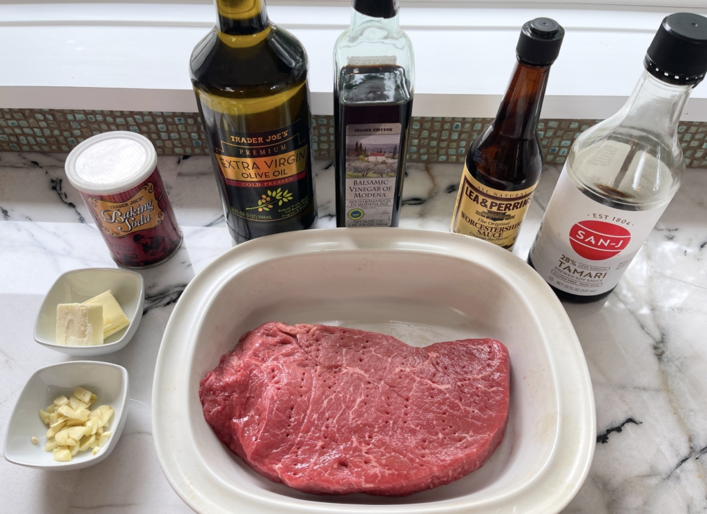 Organize all of the ingredients - garlic, olive oil, balsamic vinegar, gf soy sauce, worcestershire sauce, baking soda, london broil, salt/pepper, and unsalted butter