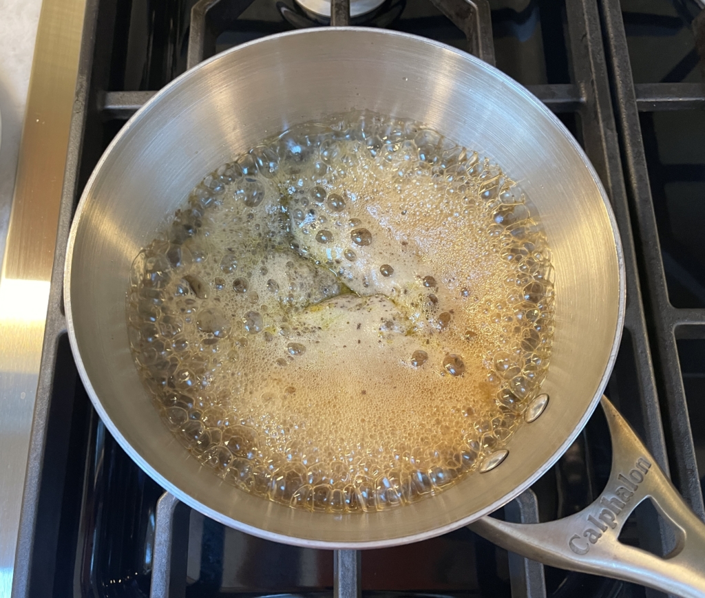 Place reserved marinade and 1/3 cup water in a small saucepan and bring to a soft simmer. The marinade will bubble because of the baking soda. Cook on medium heat for 4-5 minutes stirring to avoid overflow.  