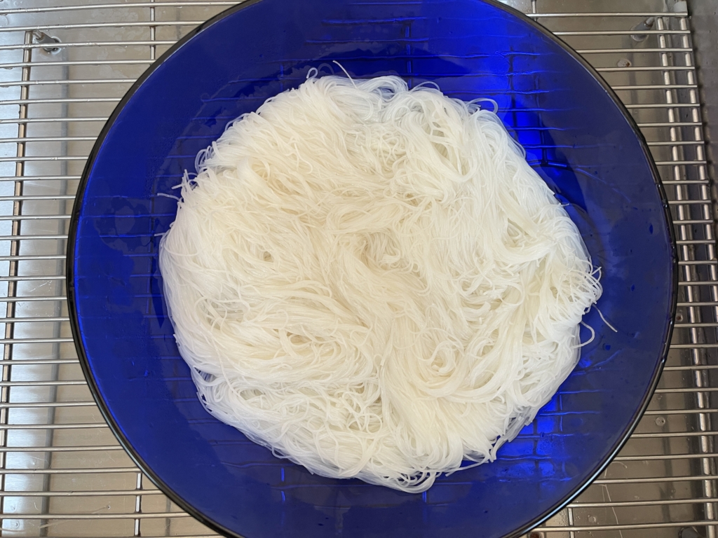 Drain noodles and set aside. Add a little bit of oil to the noodles to keep them pliable.