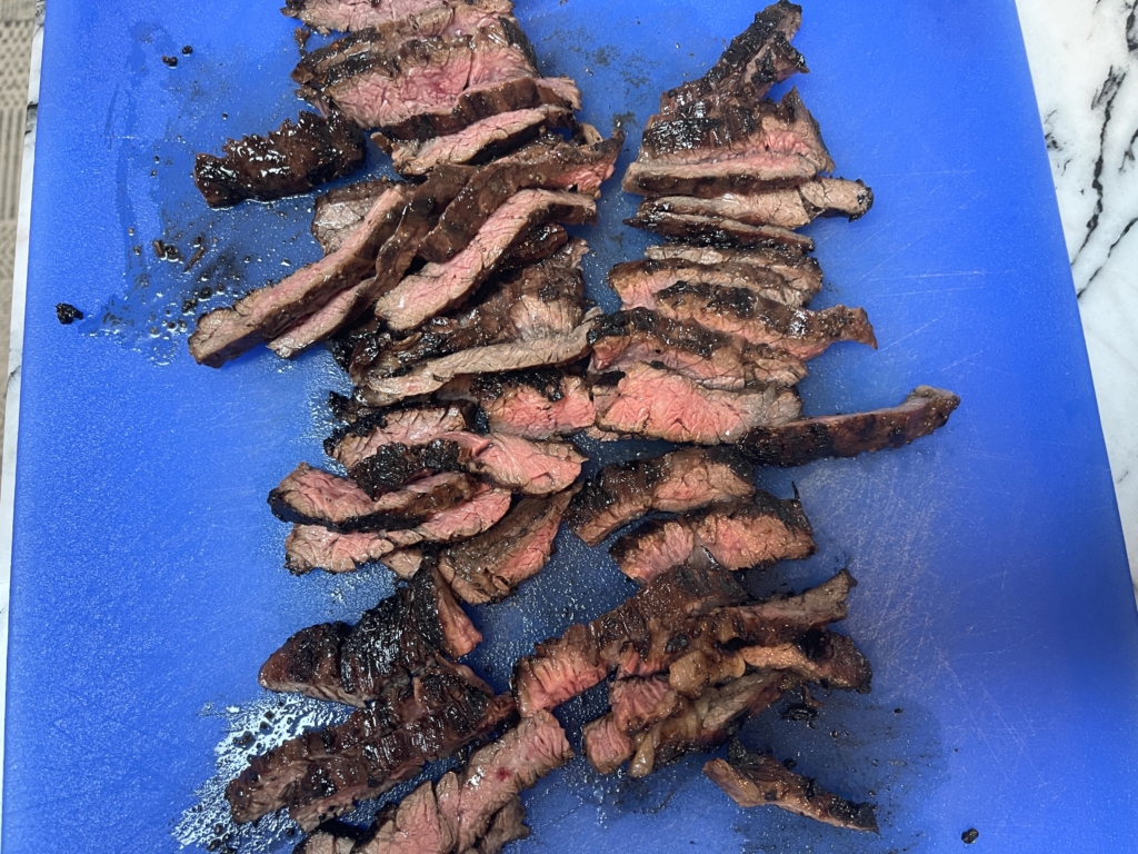 After steak rests, slice meat across the grain.