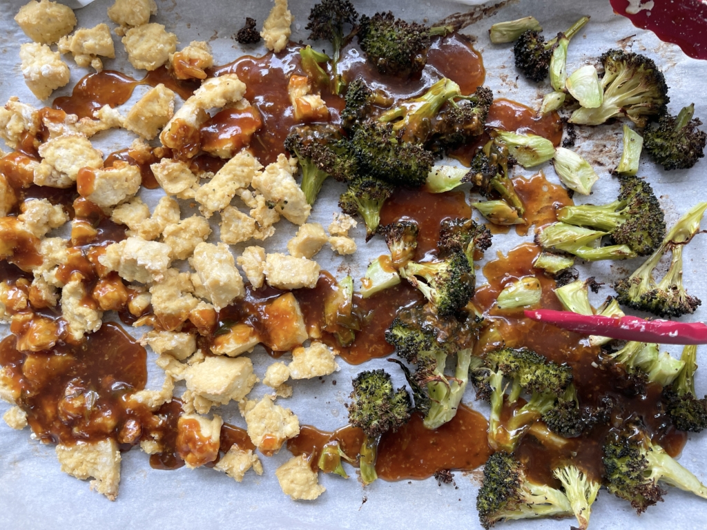 Spoon half of orange glaze over the broccoli and tofu