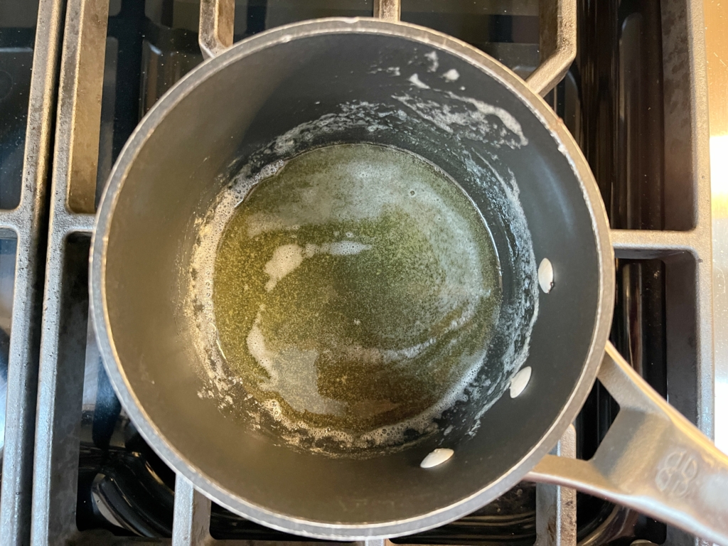 Remove clarified butter from the heat and let stand for 3 minutes