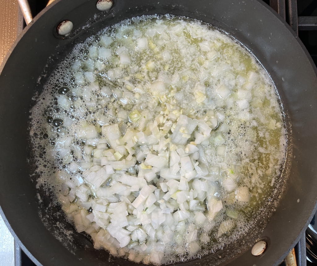 Once butter is melted add onion and garlic and cook until softened, about 5 minutes.