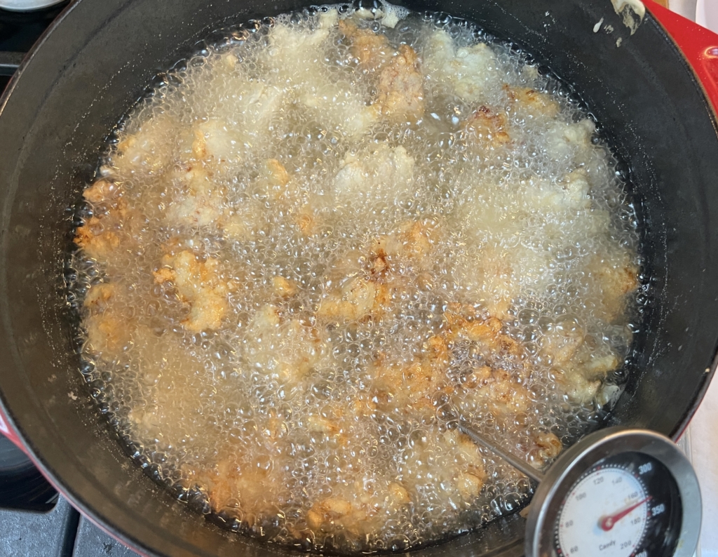 Pour oil into a large Dutch oven or other heavy pot to come 3-5" up the sides. Fit pot with thermometer and heat oil over medium-high until thermometer registers 350°. Working in approx. 3 batches, fry chicken, turning occasionally, until cooked through and golden brown, 7–10 minutes. 