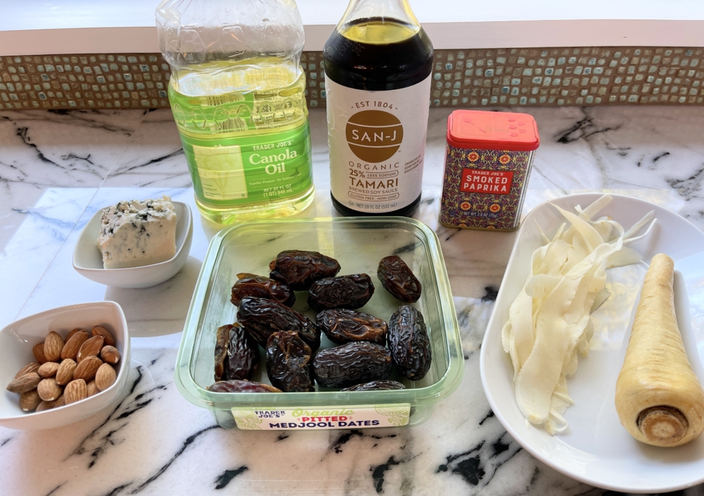 Organize the ingredients - dates, whole almonds, blue cheese, parsnip, smoked paprika, gluten free soy sauce and a neutral oil.