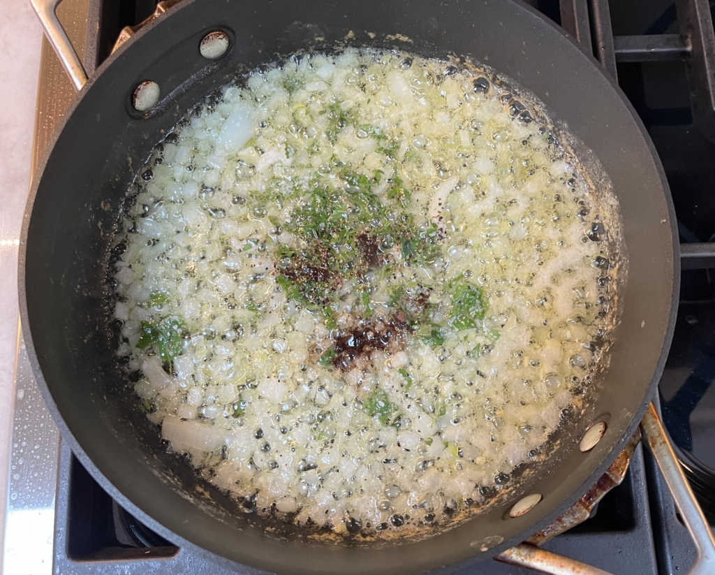 Next, add herbs, kosher salt, black pepper, and allspice. Stir ingredients to combine