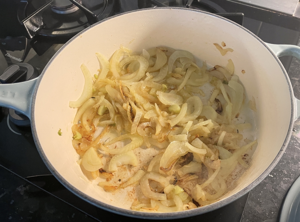 Cover and cook, stirring occasionally, until onion is translucent and fennel is beginning to brown around the edges, 8–10 minutes. 