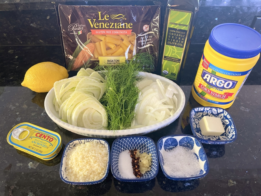 ingredients - gluten free rigatoni pasta, fennel, onion, sugar, garlic, kosher salt, anchovies, parmesan, lemon, olive oil, cornstarch and unsalted butter
