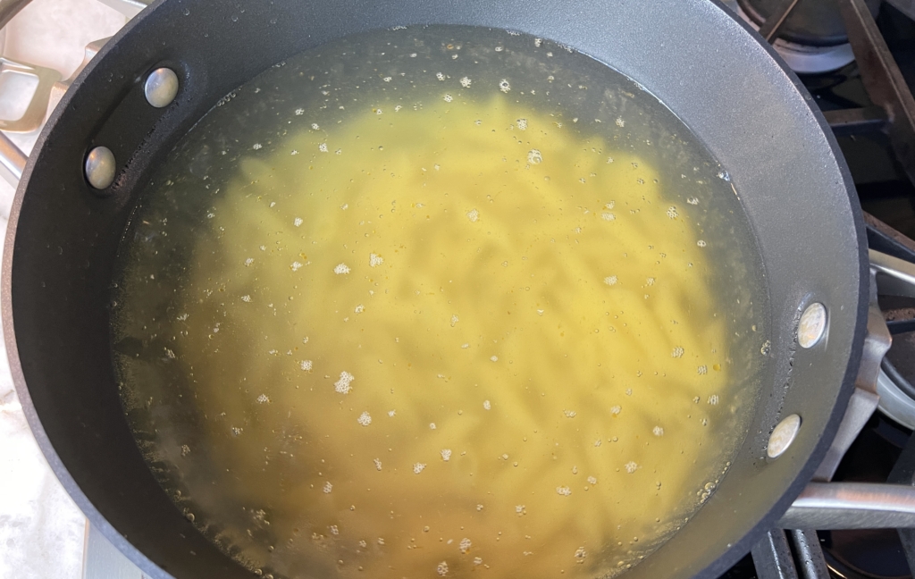 In a large pot of boiling, salted water cook the pasta to al dente following package instructions (usually one minute less than package instructions). 