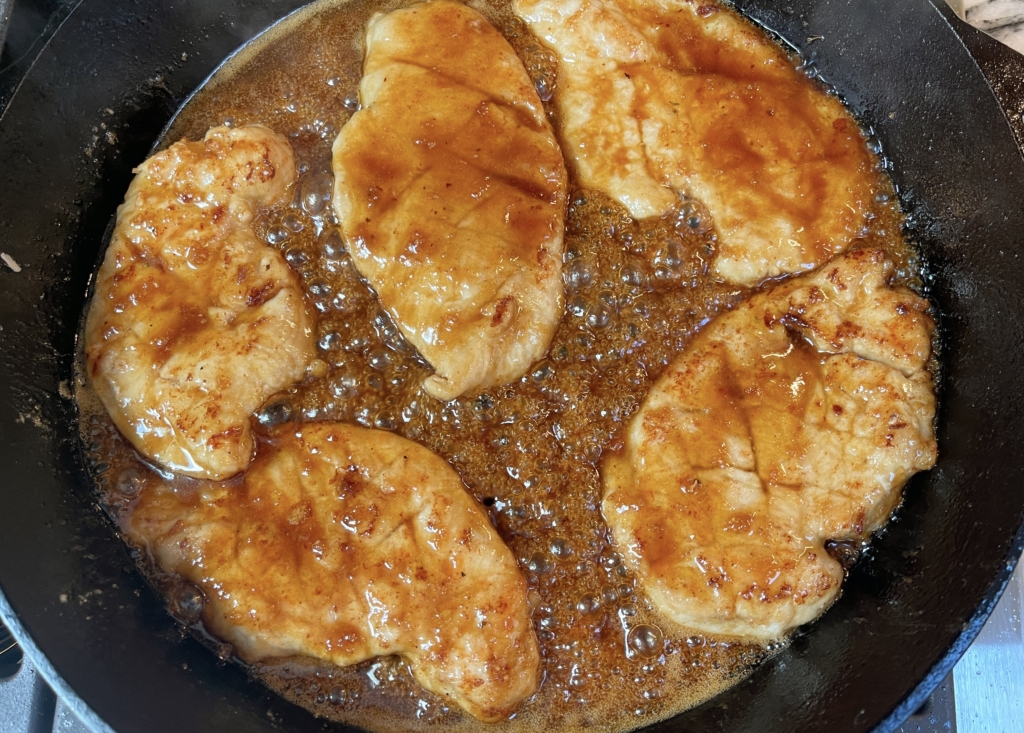 Transfer chicken back into pan and reheat for an additional 1-2 mins and spoon sauce over the breast while reheating.