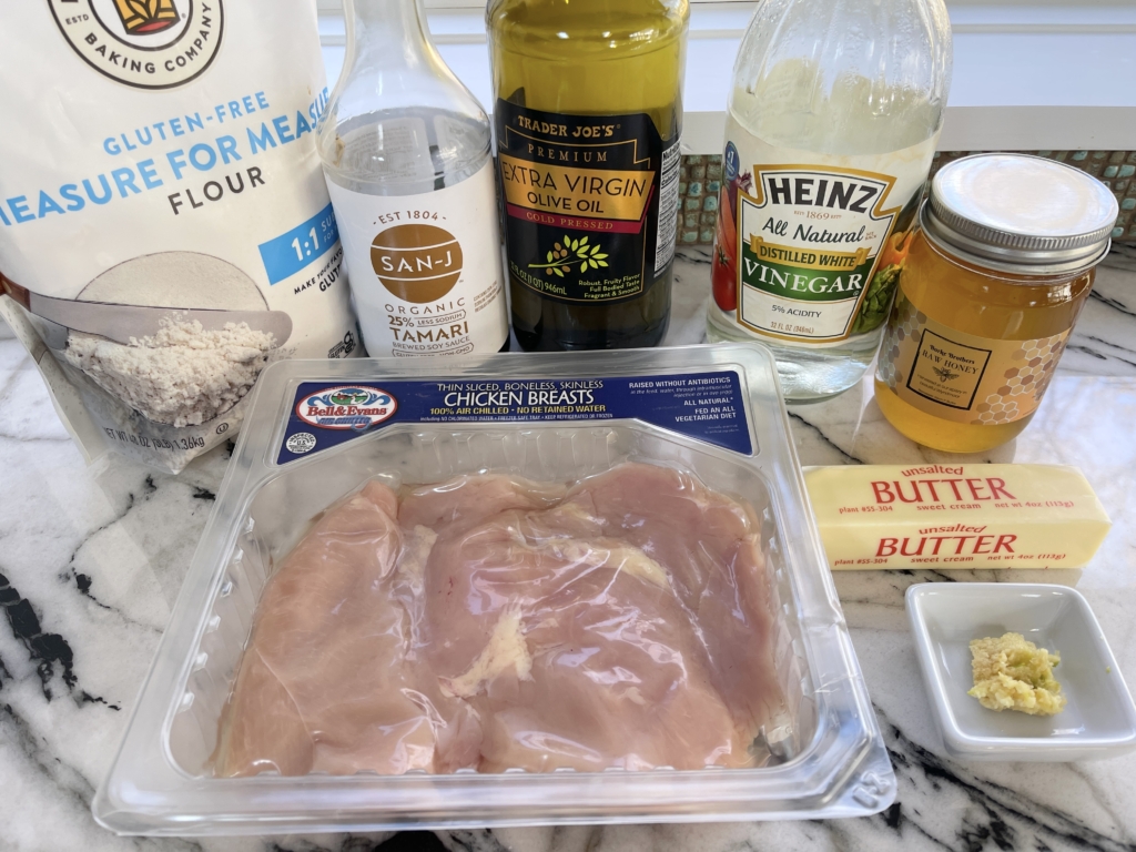 ingredients - chicken breast sliced thinly, honey, garlic, butter, olive oil, gluten free soy sauce, distilled white vinegar, and gluten free flour