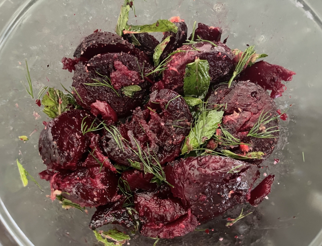 Toss beets until coated with the vinaigrette and herbs.