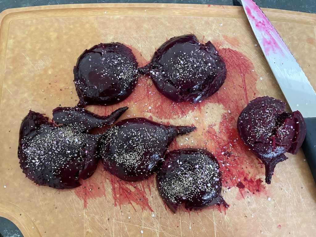 Season both sides of the beets with kosher salt and black pepper.