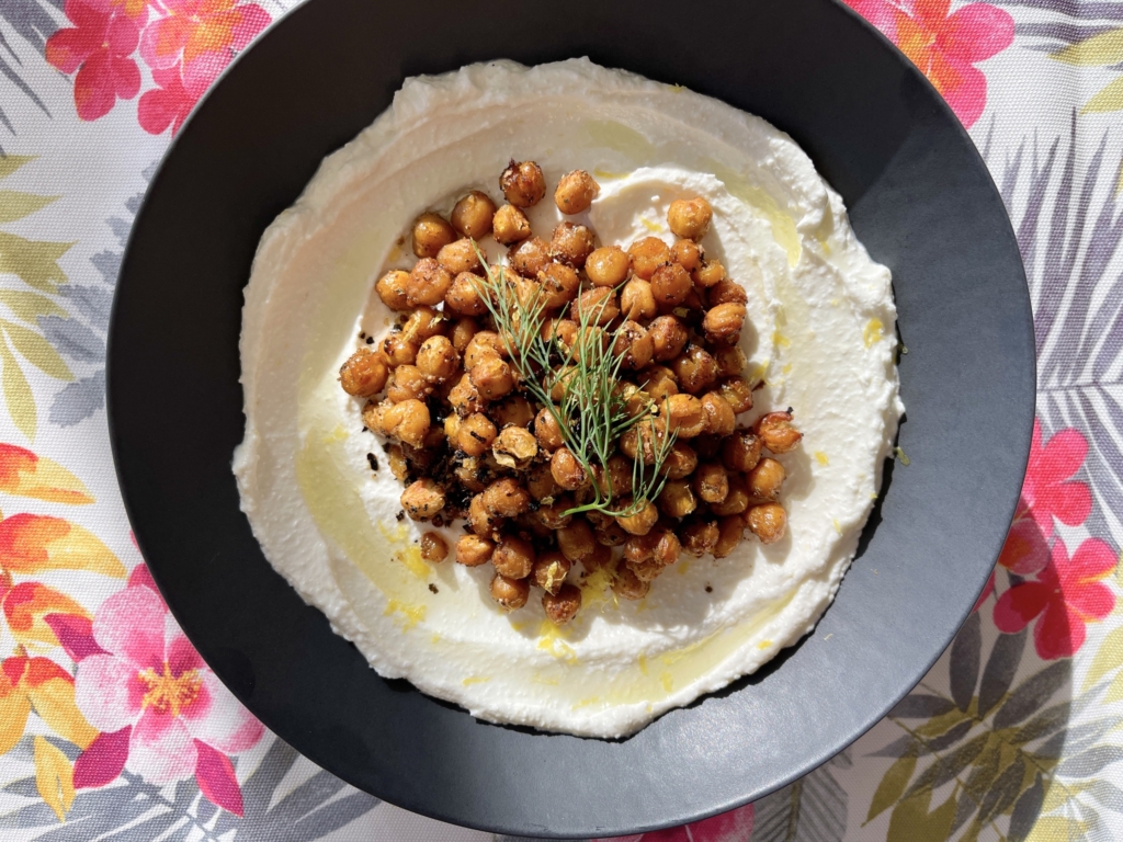 Whipped Feta with Spiced Crispy Chickpeas. Spoon the chickpeas on top of the feta. Drizzle with olive oil and garnish with any extra lemon zest and a sprig of dill.
