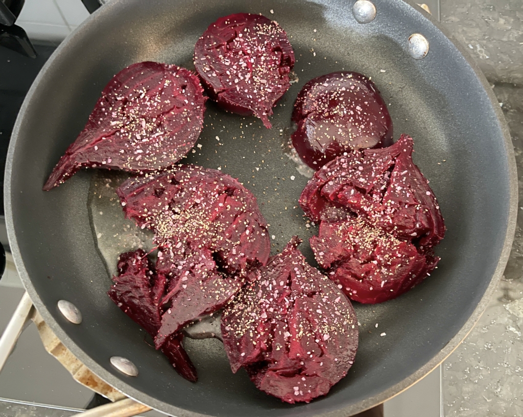 Heat oil in the pan on medium-high heat and carefully place beets in the pan. Cook for 4 minutes or until the bottom side has browned.