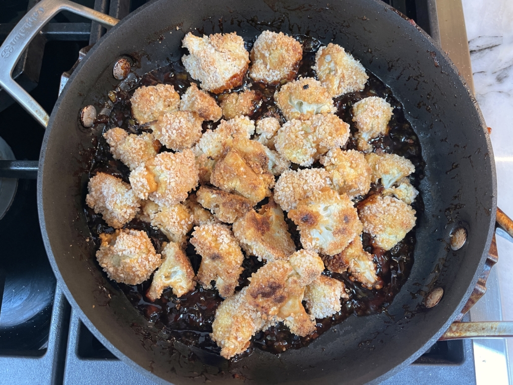 When cauliflower is finished cooking, add the florets to the sauce pan