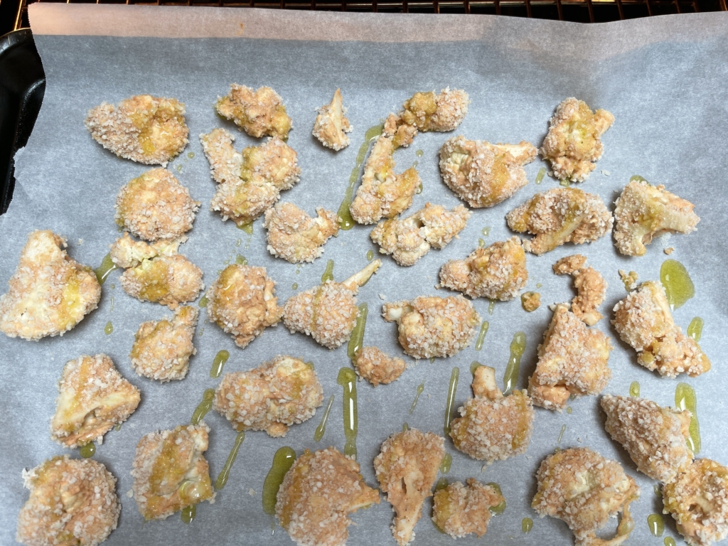 Transfer florets to the baking sheet and drizzle with olive oil. 