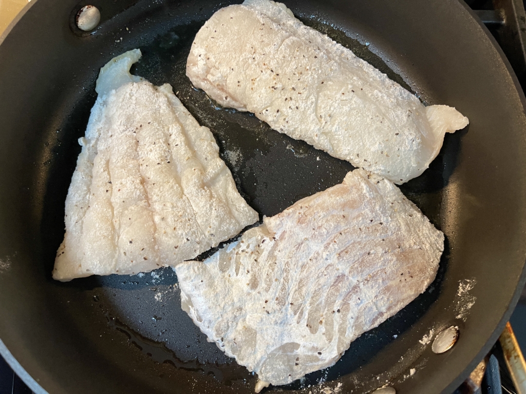 Heat a large pan with 2 tablespoons of oil over medium-high heat. Carefully place each fillet into the pan. Do not overcrowd the pan. Cook each fillet for 2-3 minutes.