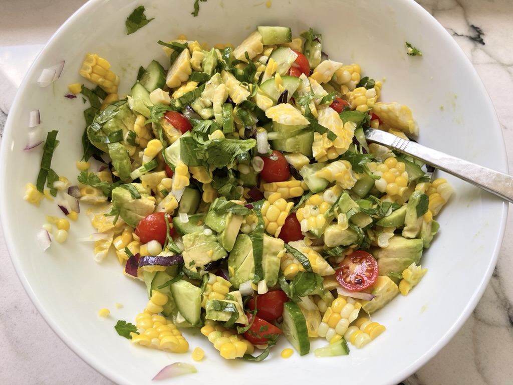 Gently combine salad ingredients.
