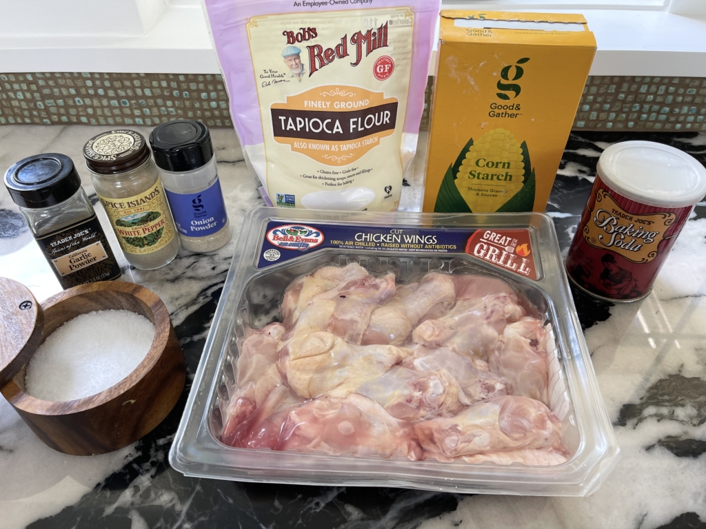 ingredients - chicken wings, tapioca starch, cornstarch, garlic powder, onion powder, white pepper, kosher salt, and baking soda.