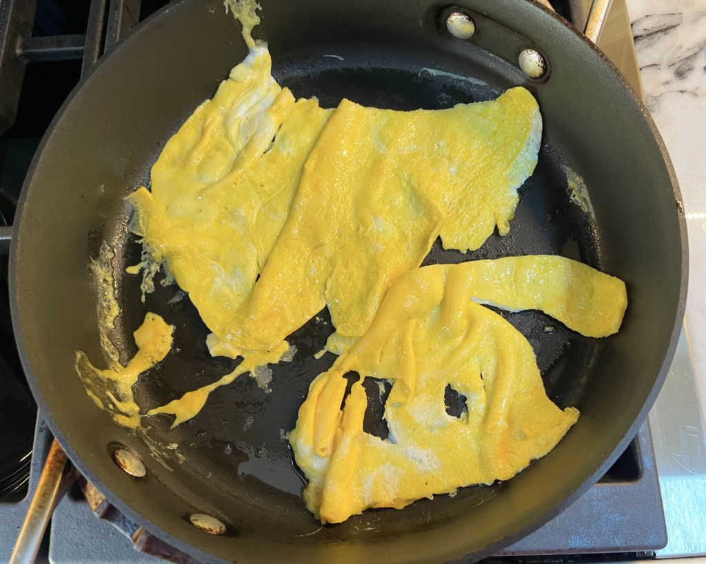 Then flip eggs over (don’t worry if the “omelette” breaks when you flip it, mine did!) and cook for an additional 1 minute. 