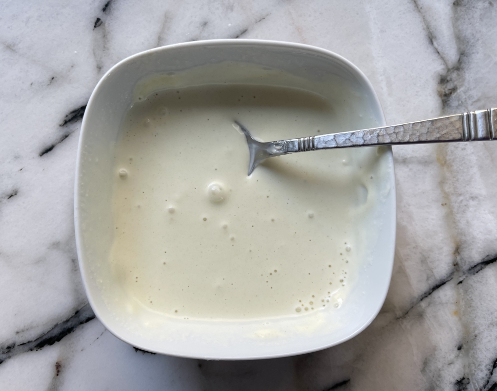 Add the remaining 1/2 tablespoon of water to the mayo and wasabi paste and mix until combined. If you’d like a thinner wasabi mayo, add more cold water in 1 teaspoon increments.
