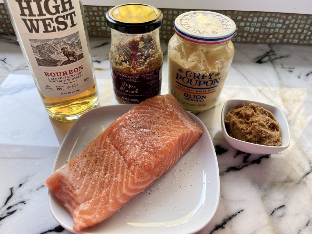 organize the ingredients - salmon filet, mustards (grainy and Dijon), dark brown sugar, and bourbon (optional)