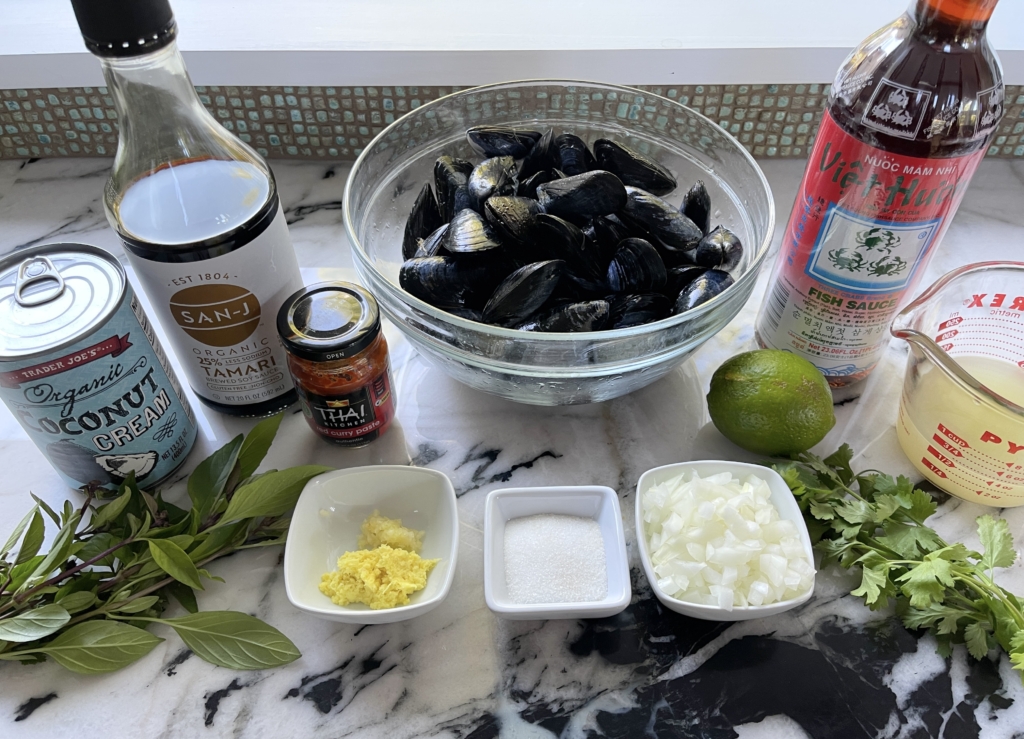 ingredients - mussels, coconut milk or coconut cream, red curry paste, onion, garlic, ginger, gf soy sauce, sugar, coconut/vegetable/canola oil, broth, lime, and cilantro/thai basil.