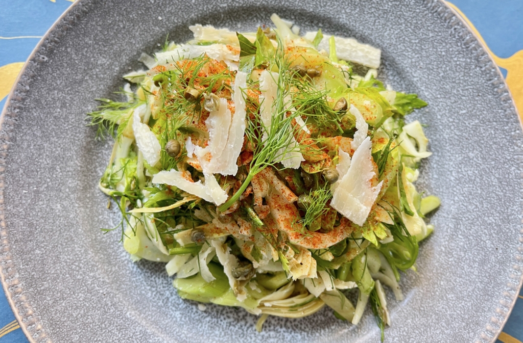 Transfer salad to a medium-sized bowl or platter and garnish with remaining fennel fronds, parmesan, smoked paprika (optional), and a couple of grinds of black pepper