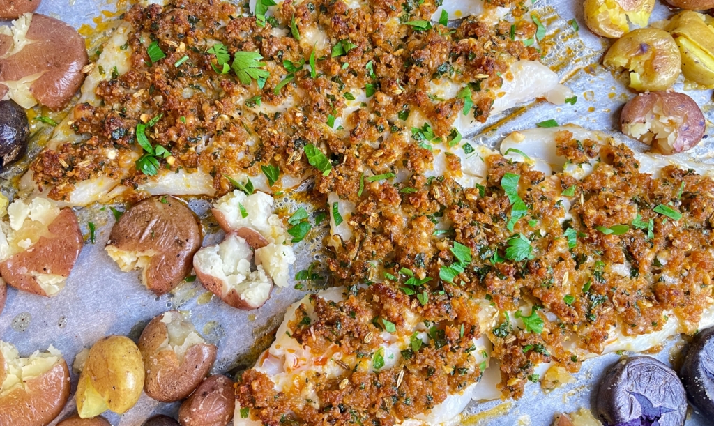 Sheet Pan Fish with Chorizo Crust - Serve fish and potatoes straight from the pan or place on a large platter. Top fish with parsley and season potatoes with additional olive oil, kosher salt and pepper, if needed.