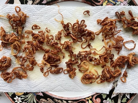 Carefully remove the shallots from the pan with a fork or wire mesh strainer and transfer to a paper towel-lined plate. Sprinkle with kosher salt while still warm.

