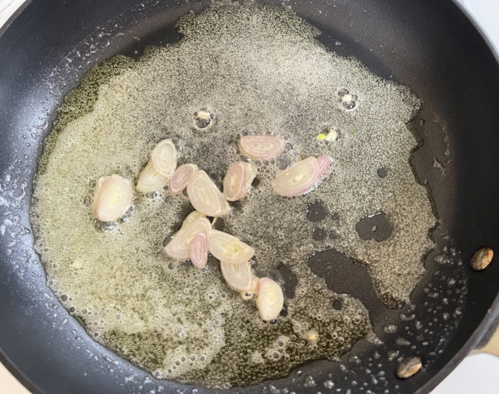 Once butter has melted, add the shallot, stirring until softened slightly, about 1 minute. 