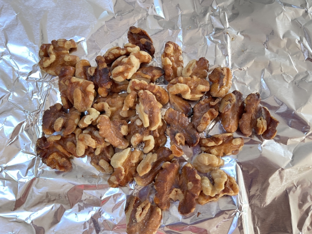 Once preheated, add walnuts and toast for 5 minutes until browned and fragrant. Set a timer! Let walnuts cool and set aside.