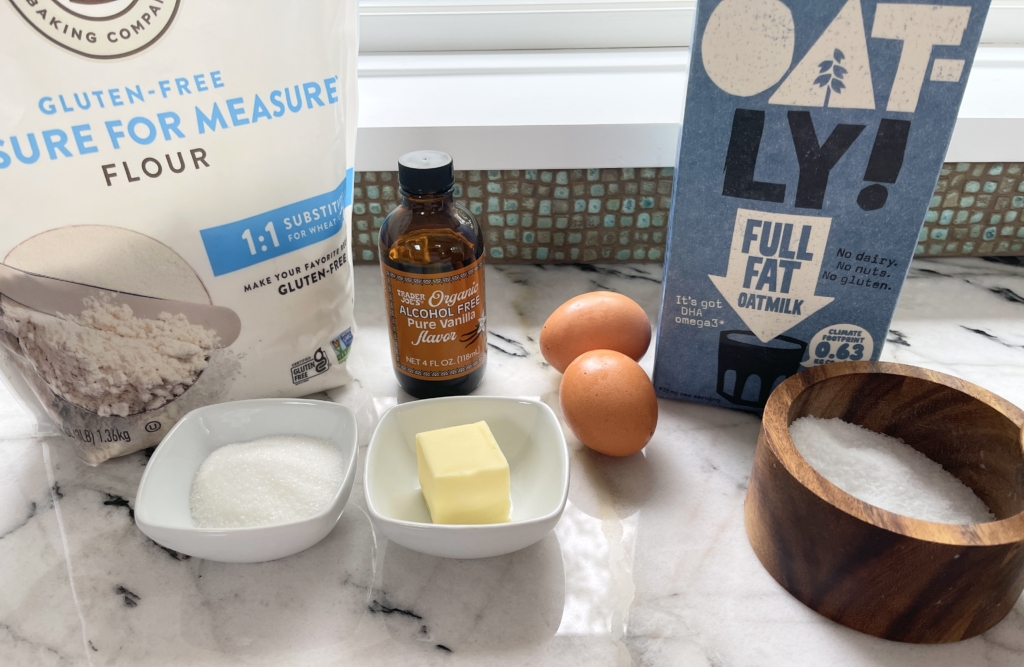 ingredients - gluten free flour, oat milk, butter, eggs, sugar, vanilla, and kosher salt.