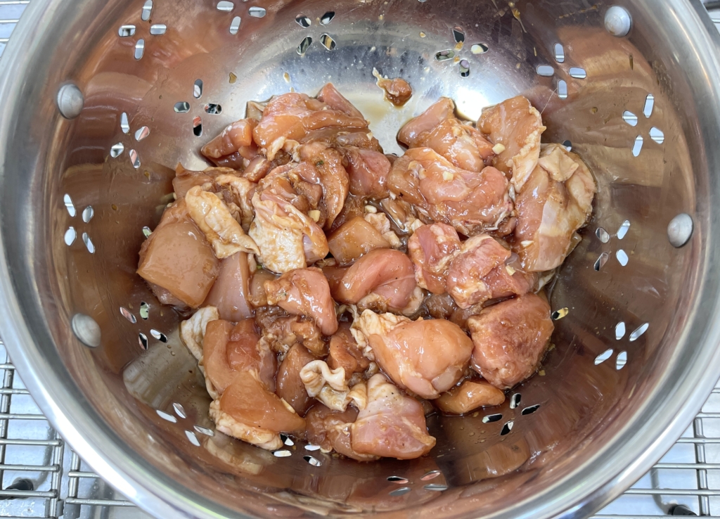 Once the chicken has marinated either drain the marinade from the chicken or use tongs and remove chicken from the marinade and place chicken in a plate.