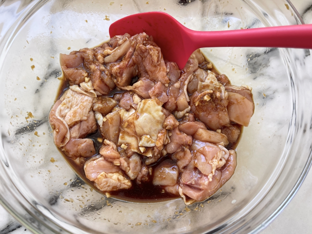 Place cut up chicken thighs in the marinade. Combine and let sit for 30-60 mins.